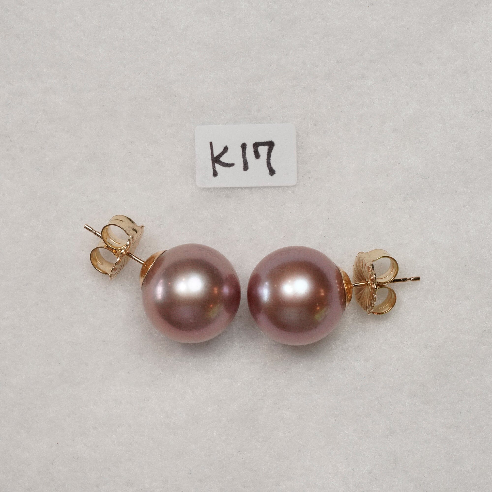 K17: 12.8 round smooth pink stud earrings on 14k