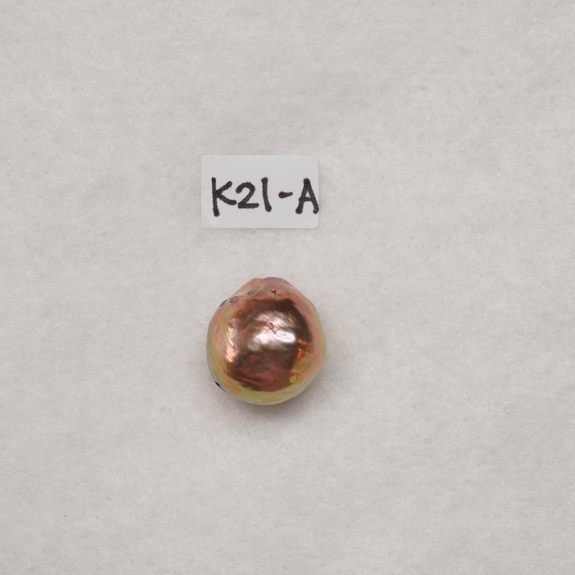 K21: 11.4 x 14.1 mm champagne peach loose pearl