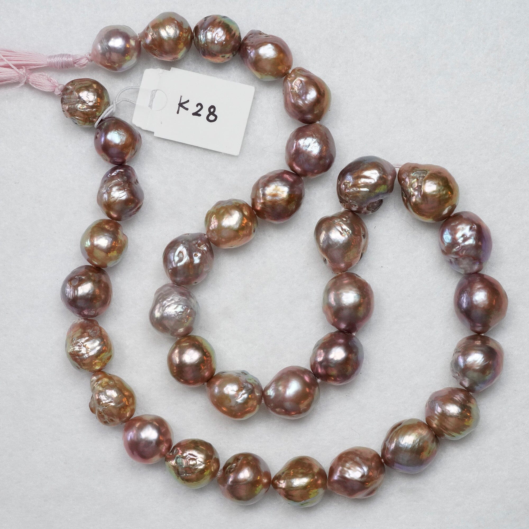 K28: 10+ x 14+mm with 35 JK pearls baby pink tassels, 17.5"